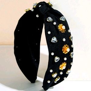 Black headband with golden flowers, pearls and heart stones